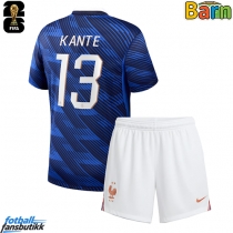 Frankrike Kante #13 Hjemmedraktsett Barn VM 2026 Kortermet (+ Korte bukser)